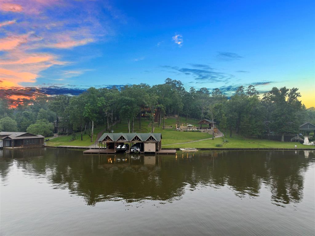 a view of lake with green space