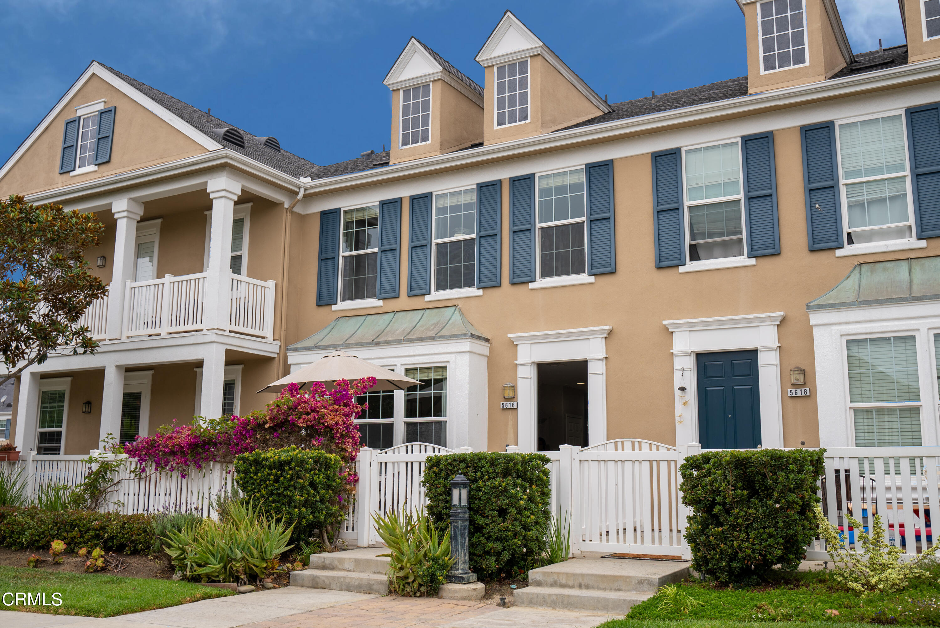 a front view of a multi story residential apartment building