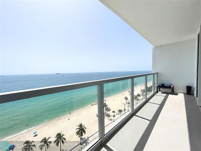 a view of balcony with ocean view