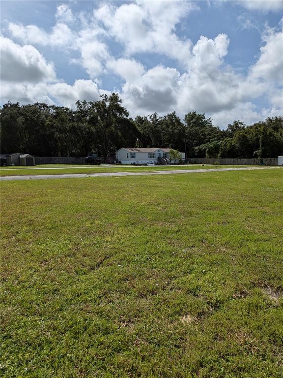 a view of outdoor space and yard