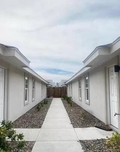 View of vehicle parking with a carport