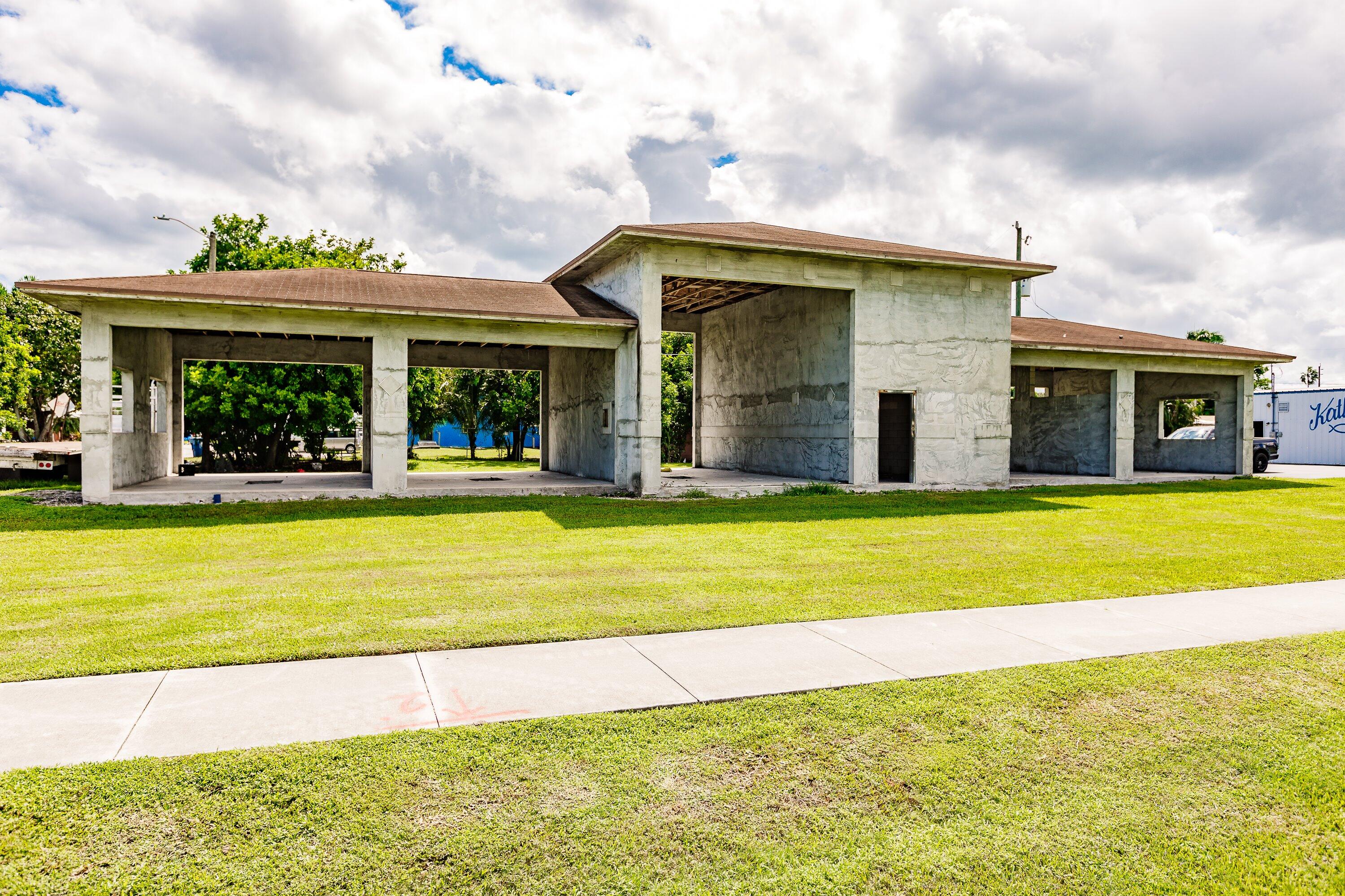 a view of house with swimming pool and outdoor space