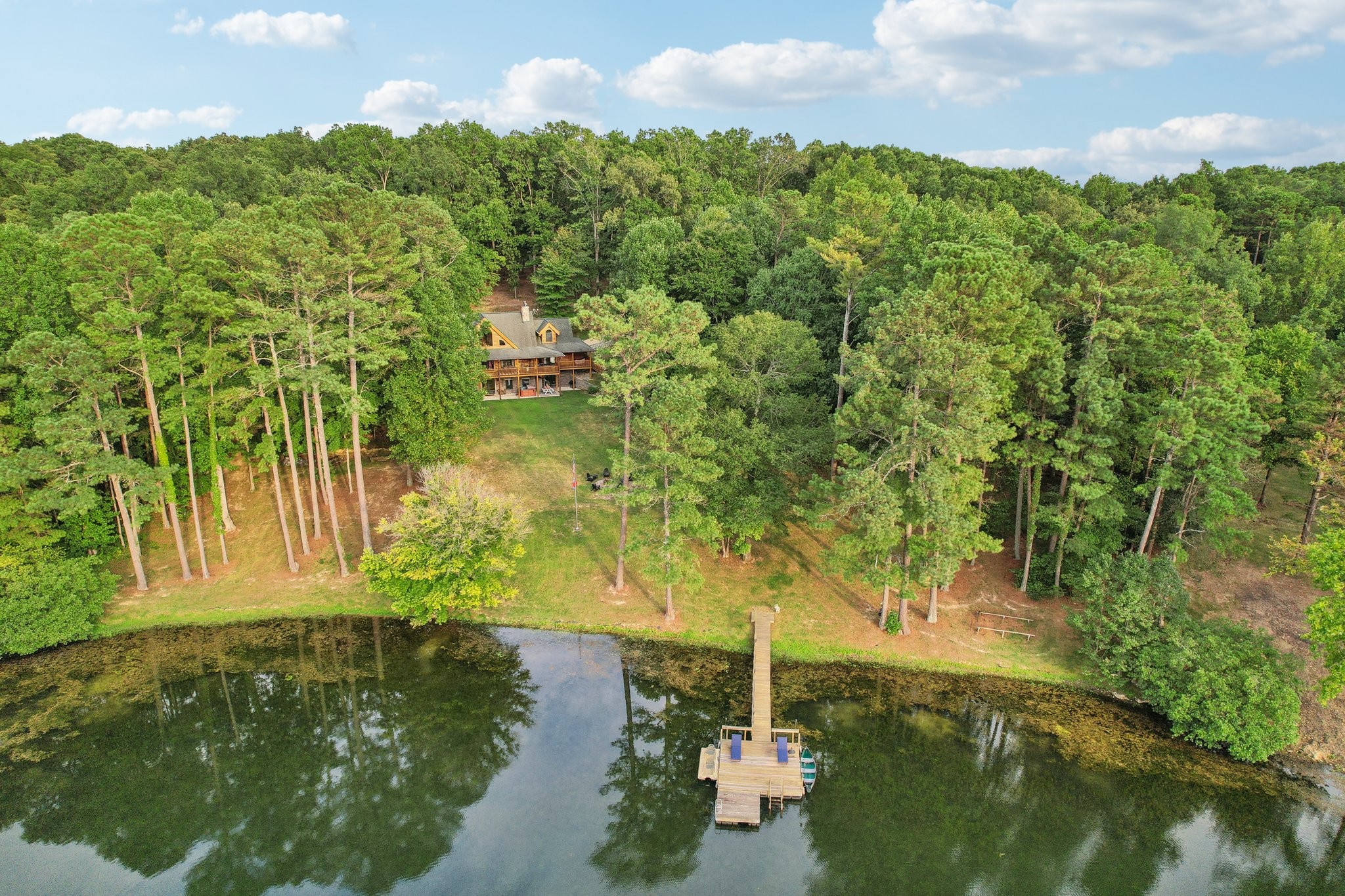 Welcome to 511 Covered Bridge, your dream lake house retreat on 5 waterfront acres!