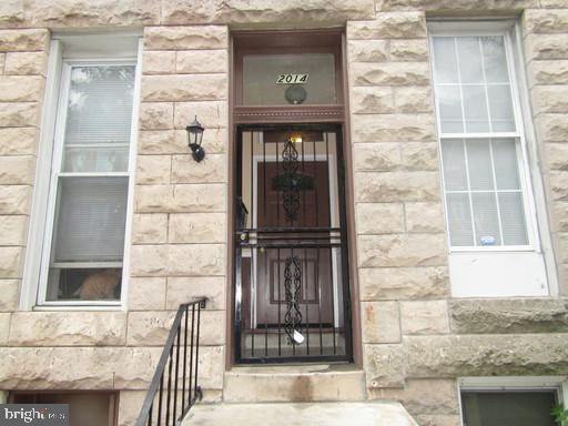 a front view of a house with a window