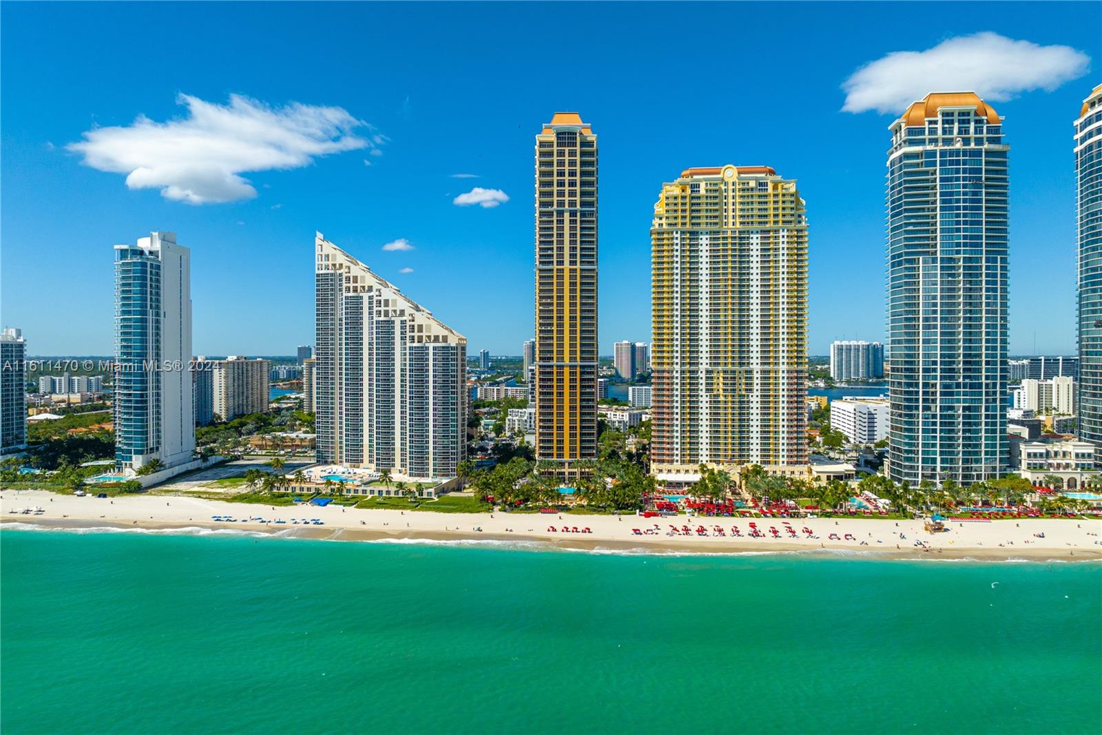 a view of a city with tall buildings