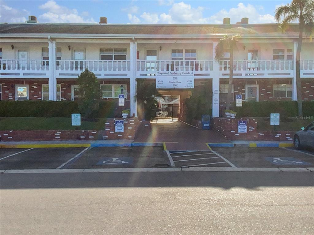 a front view of a building with street view