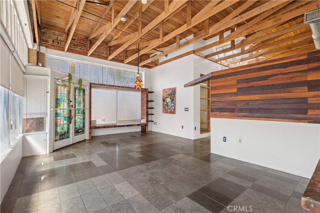 a view of a room with wooden walls