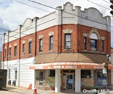 a view of a building with a street