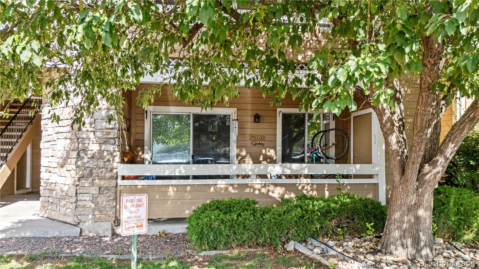 front view of house with a tree