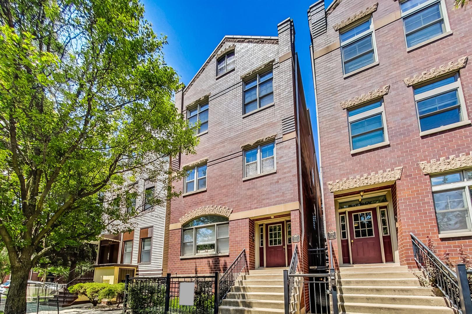 a front view of a multi story residential apartment building