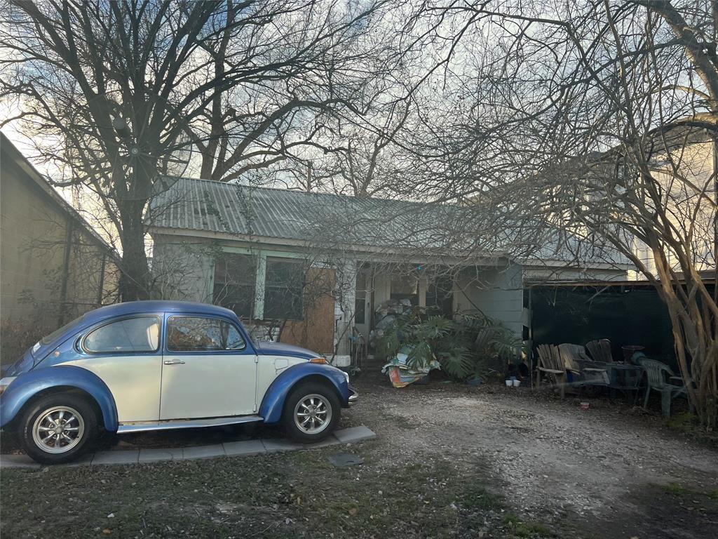 a car parked in front of a house