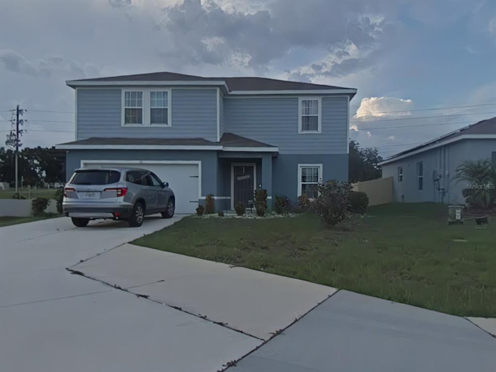 a house view with a garden space