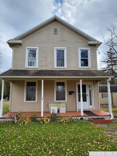 front view of a house with a yard