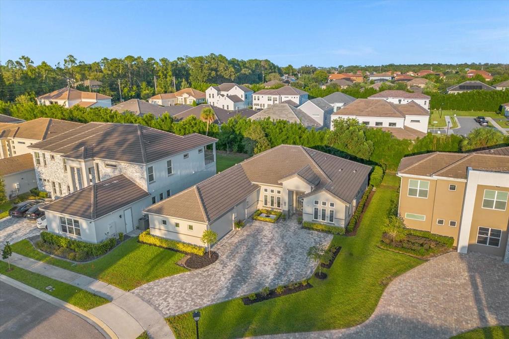 an aerial view of a house with a garden