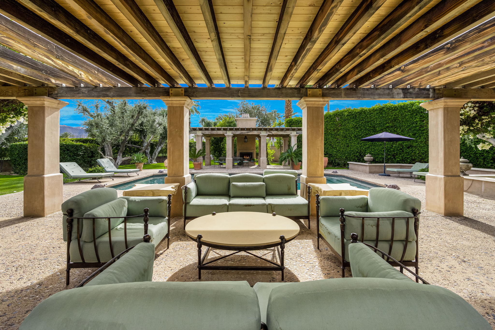 a outdoor living space with furniture and garden view