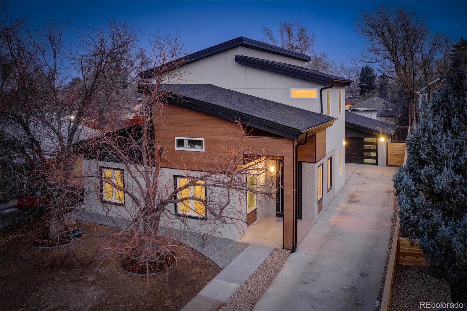 a house with trees in front of it