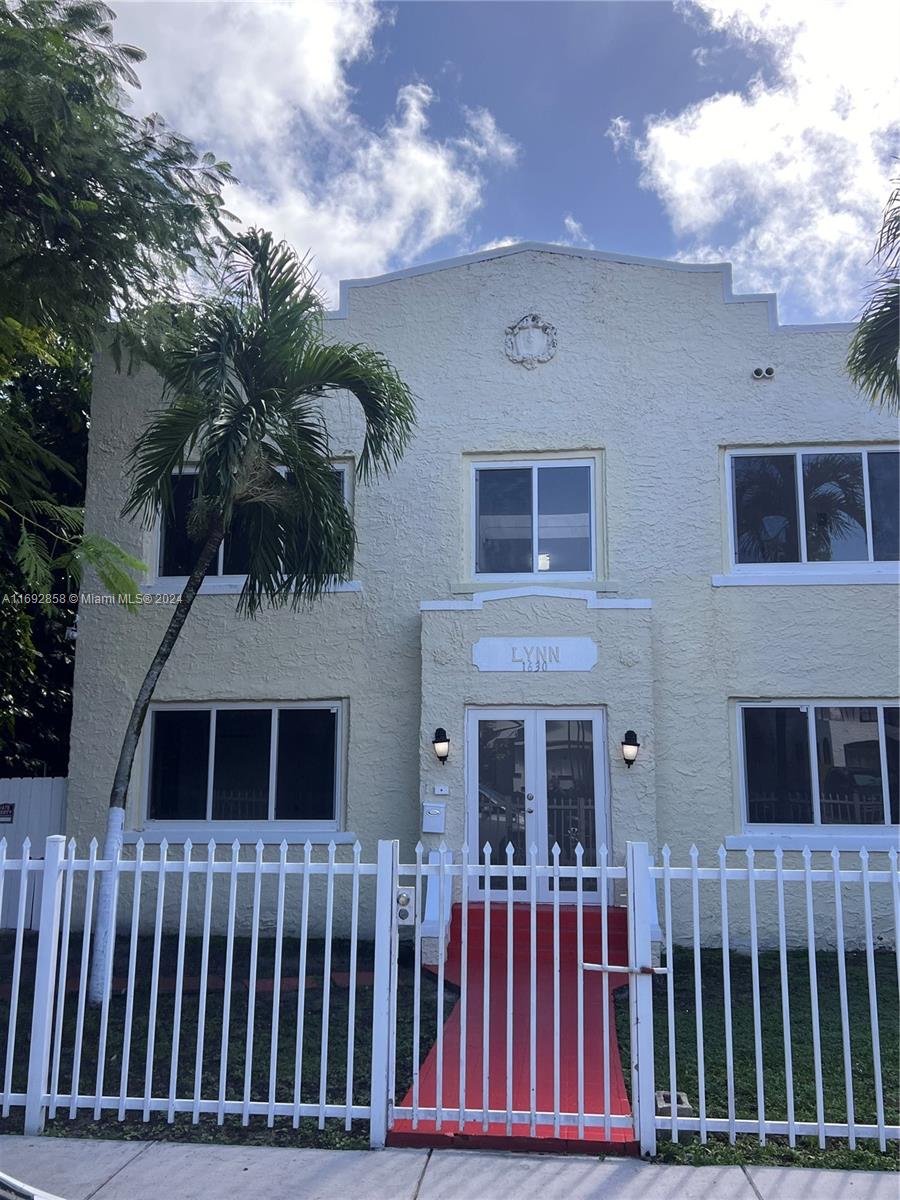 a front view of a house with balcony