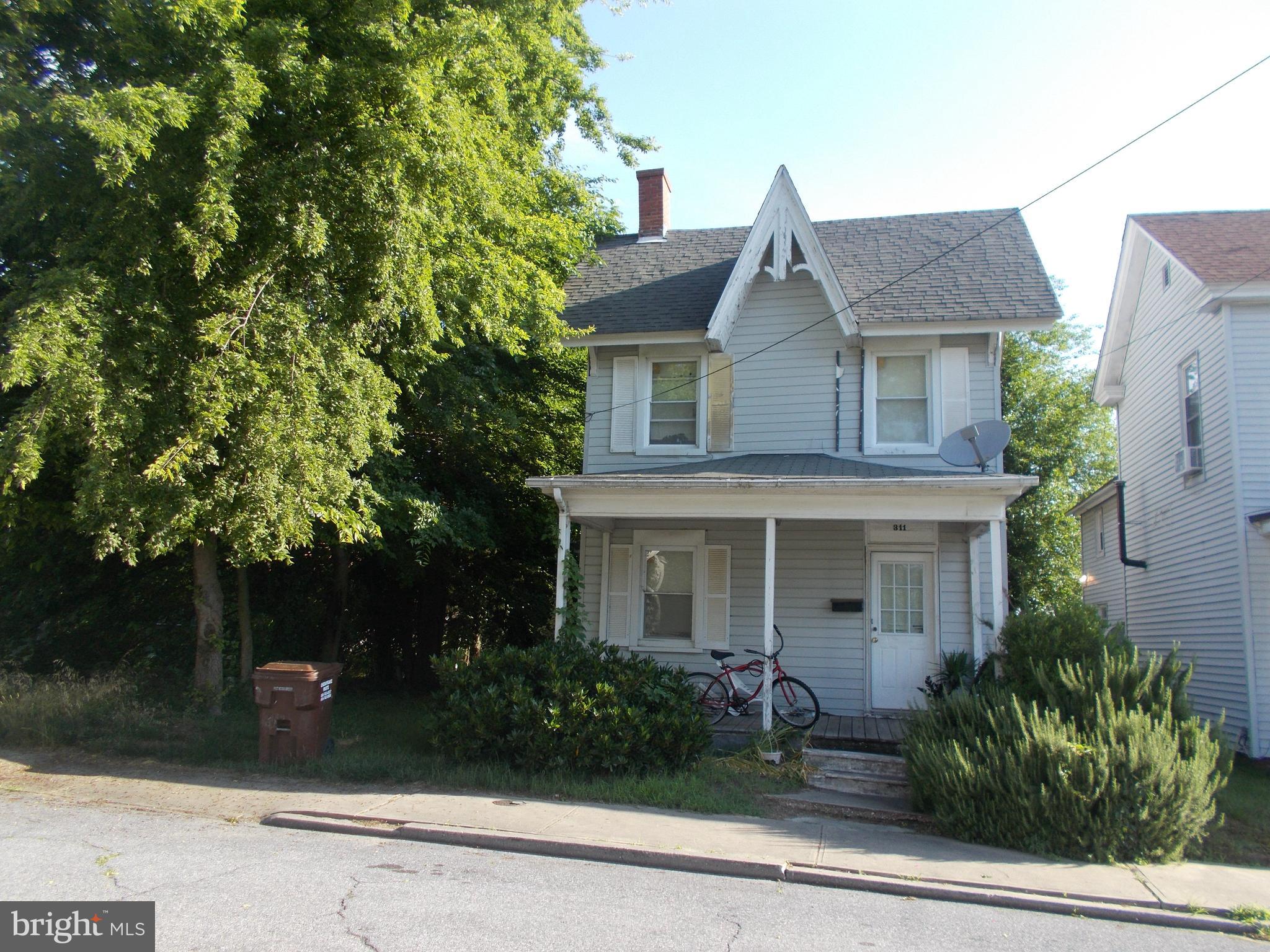 front view of house with a yard