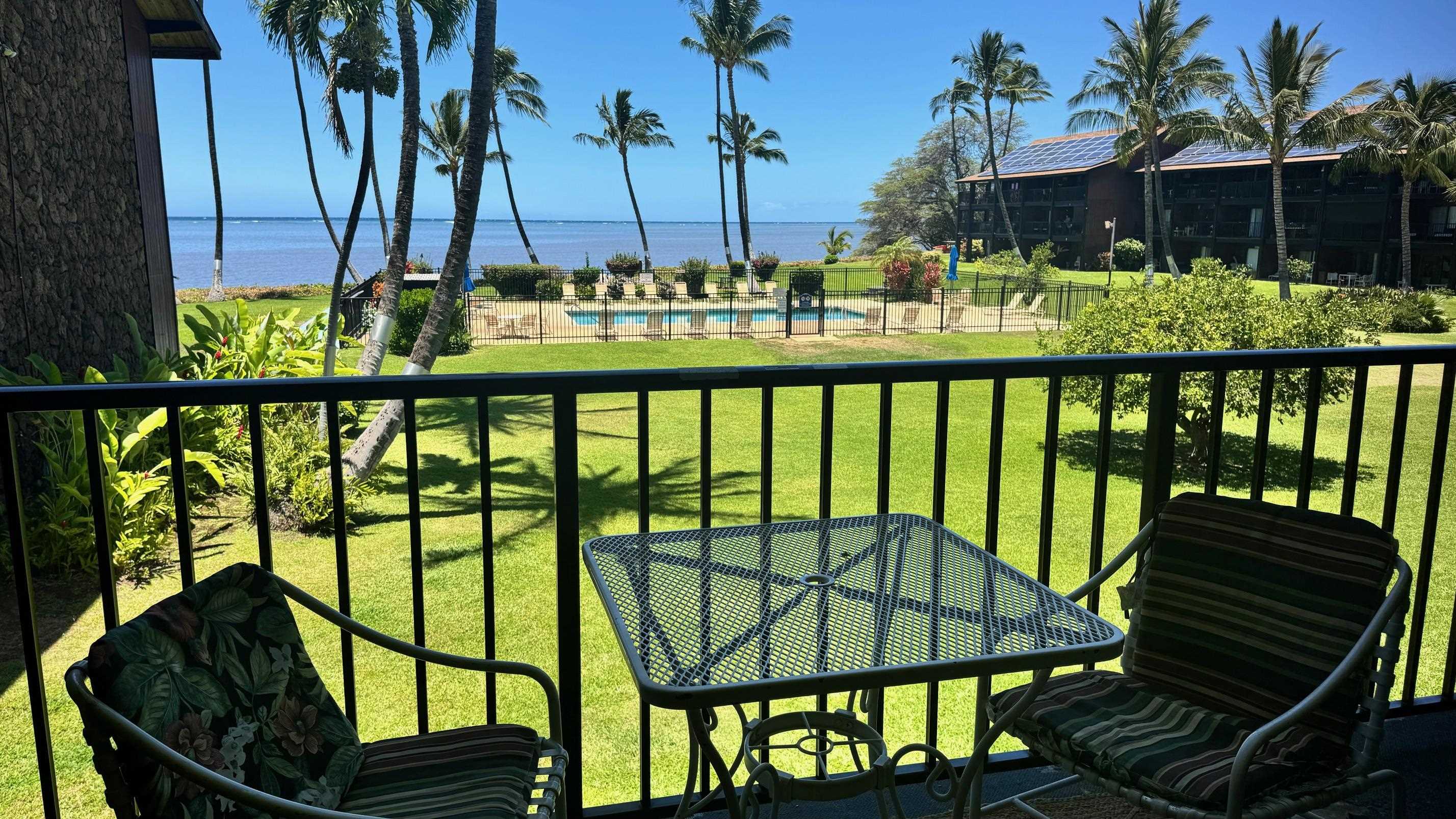 a view of a chairs on the roof deck