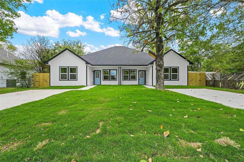 a house view with a garden space