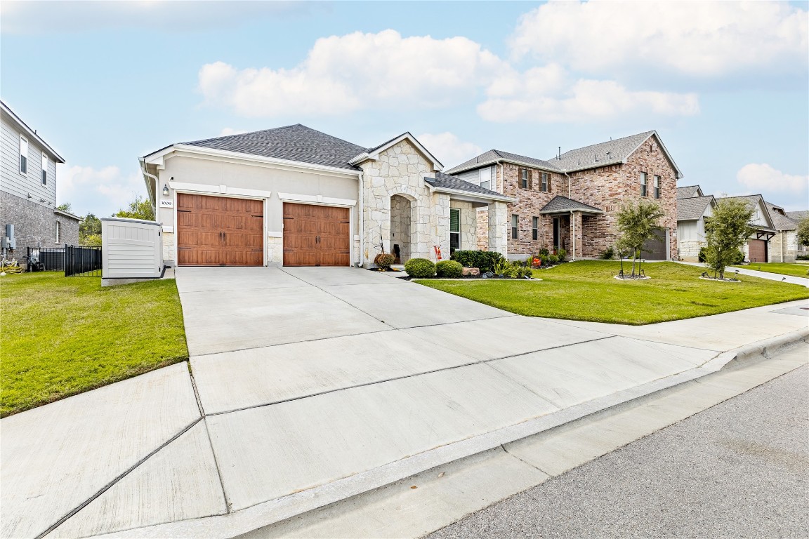 a house with yard in front of it