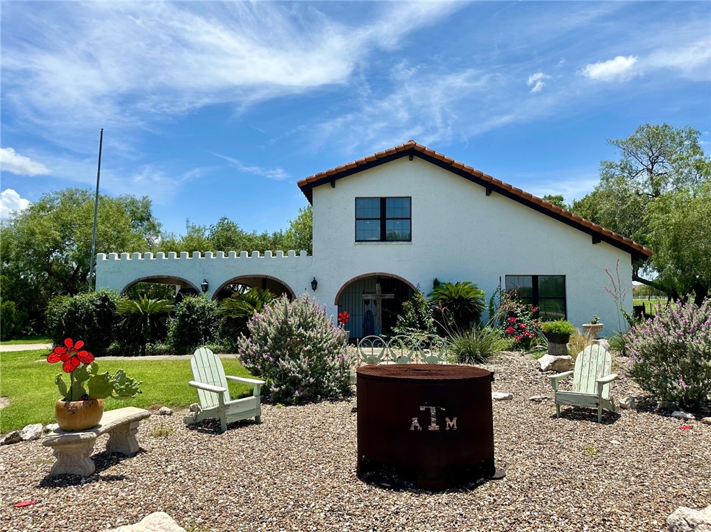 Welcome Home!
Front of home w/ gravel sitting/fir