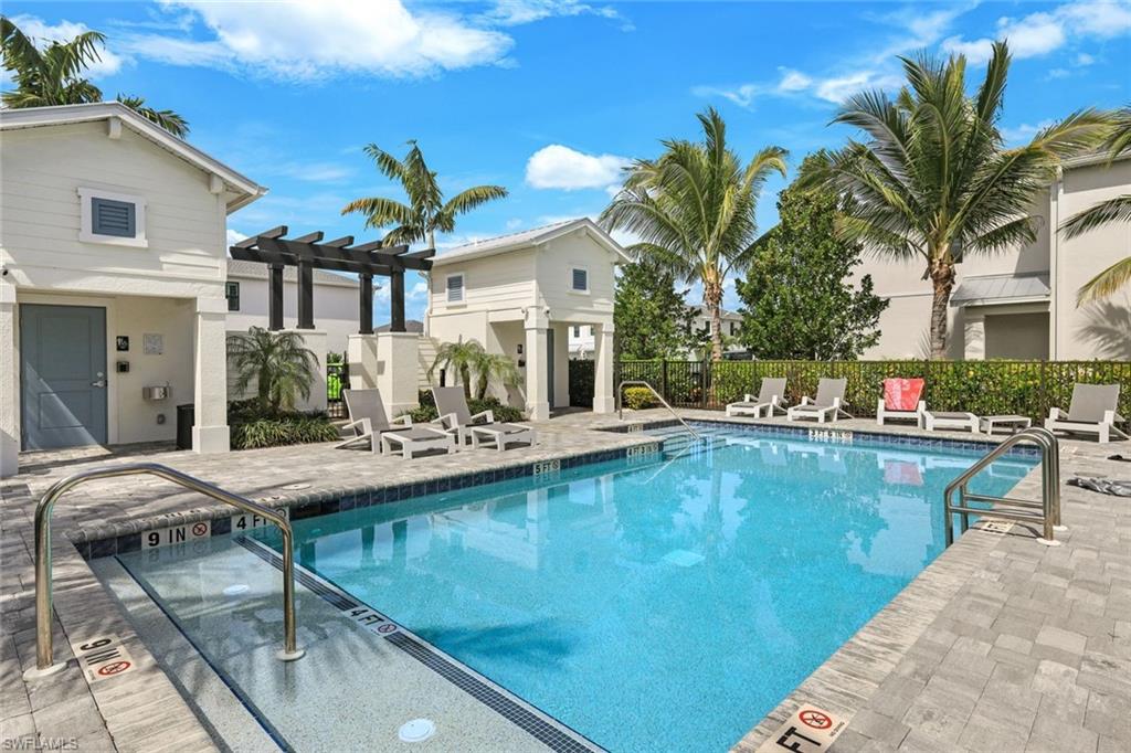 a view of a swimming pool with a patio