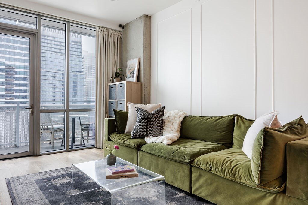 a living room with furniture and a window