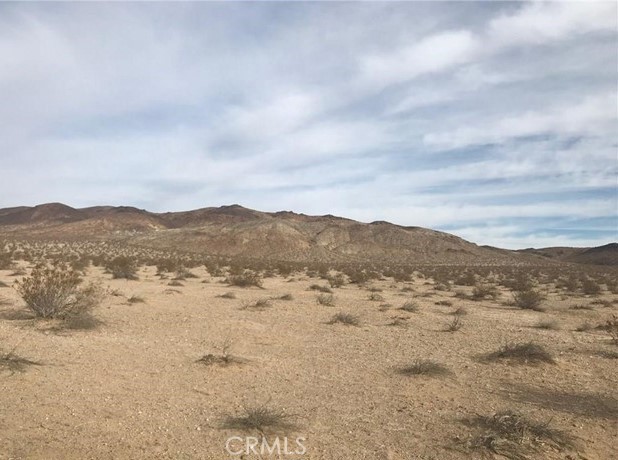 a view of mountain view with mountains in the background