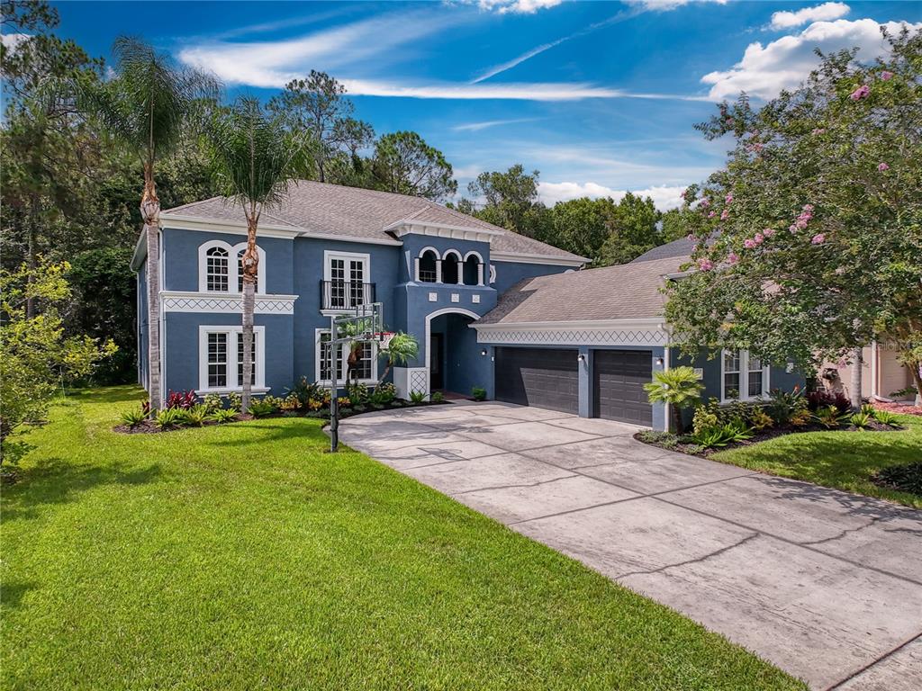 front view of a house with a yard