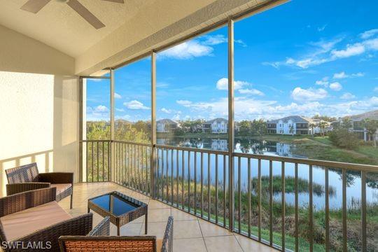 a view of a balcony with couches and wooden floor