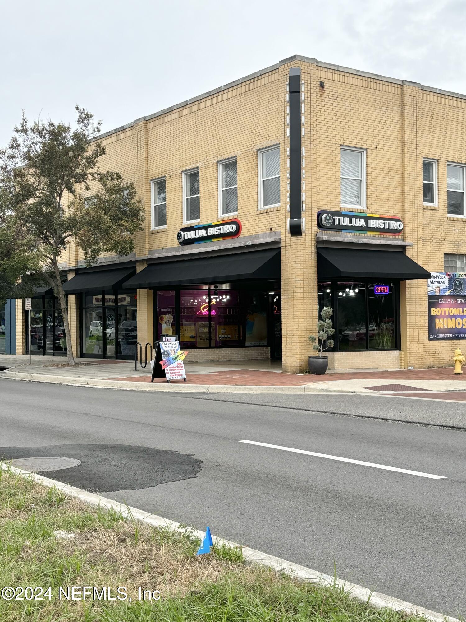 a view of a building with a street