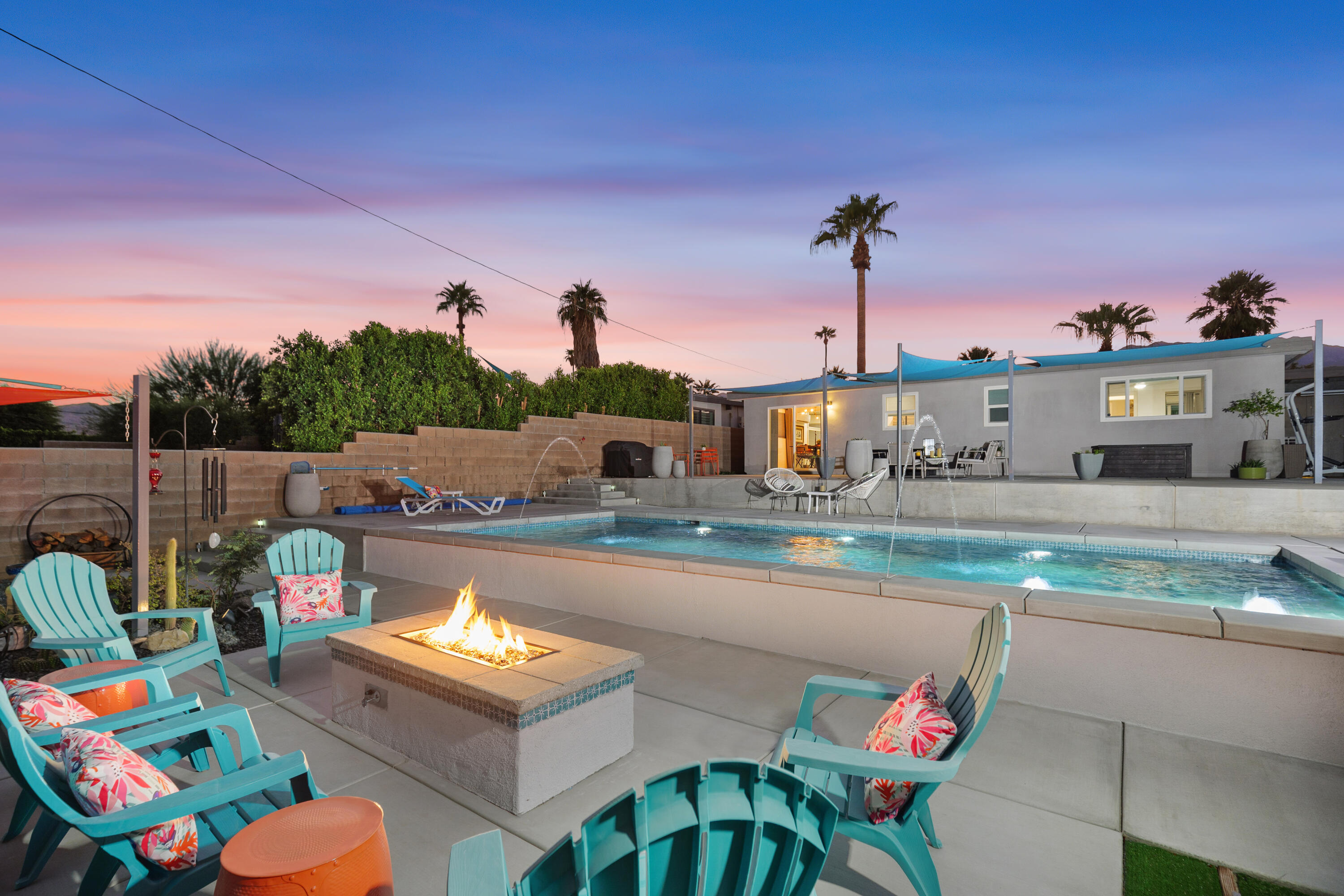 a view of a swimming pool with a lounge chairs