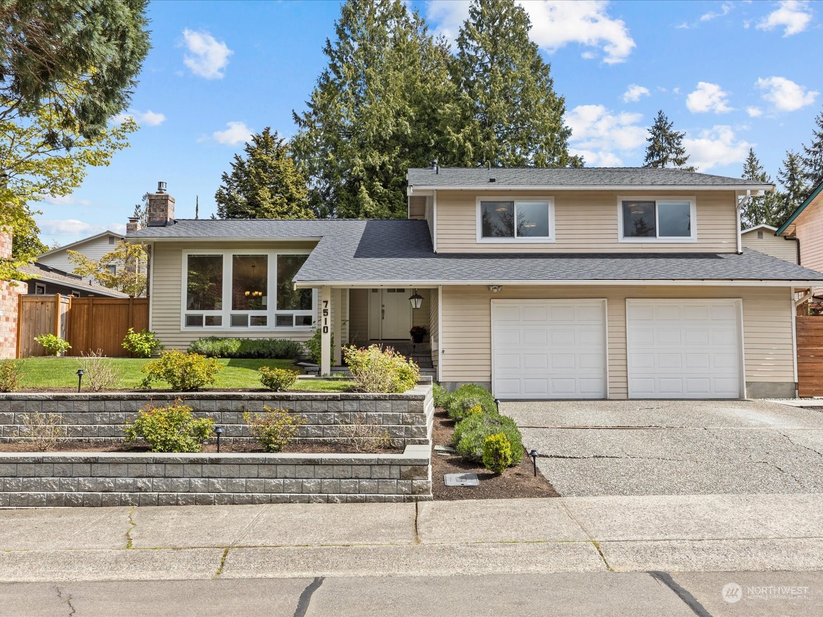 front view of a house and a small yard