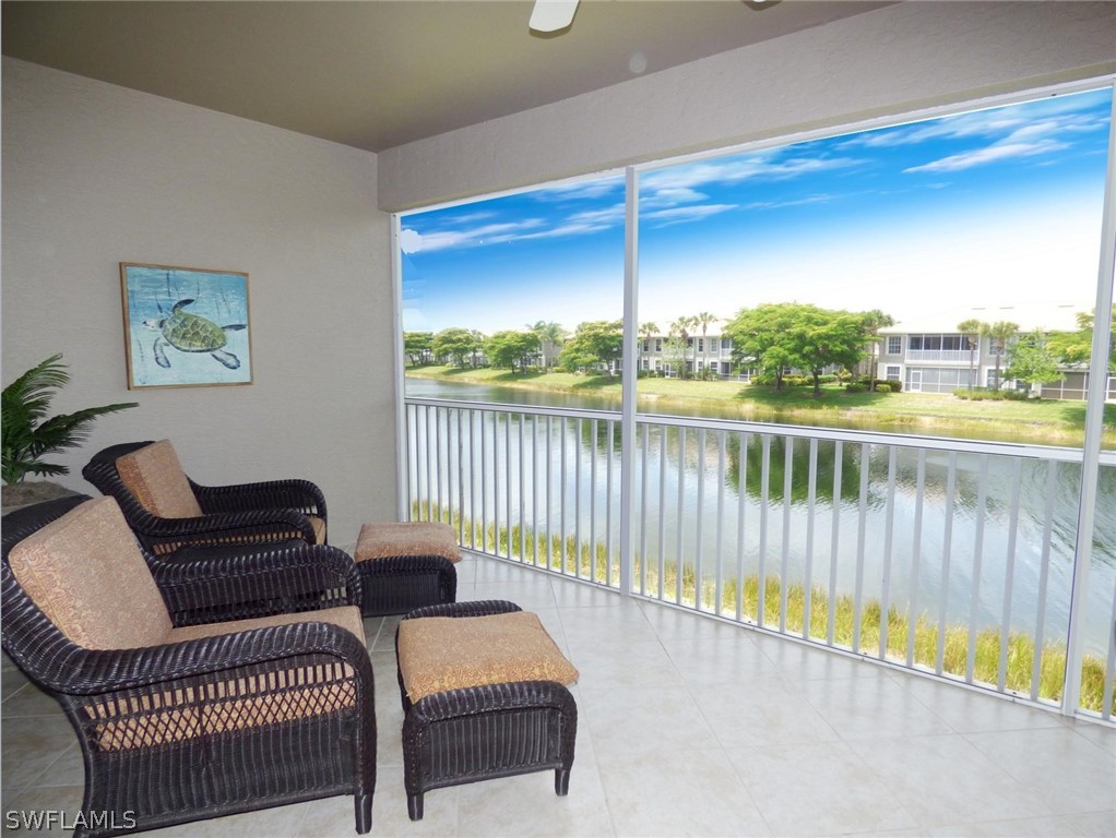 a balcony with furniture and city view