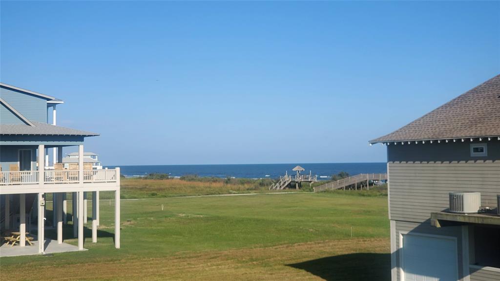 a view of a city with lawn chairs