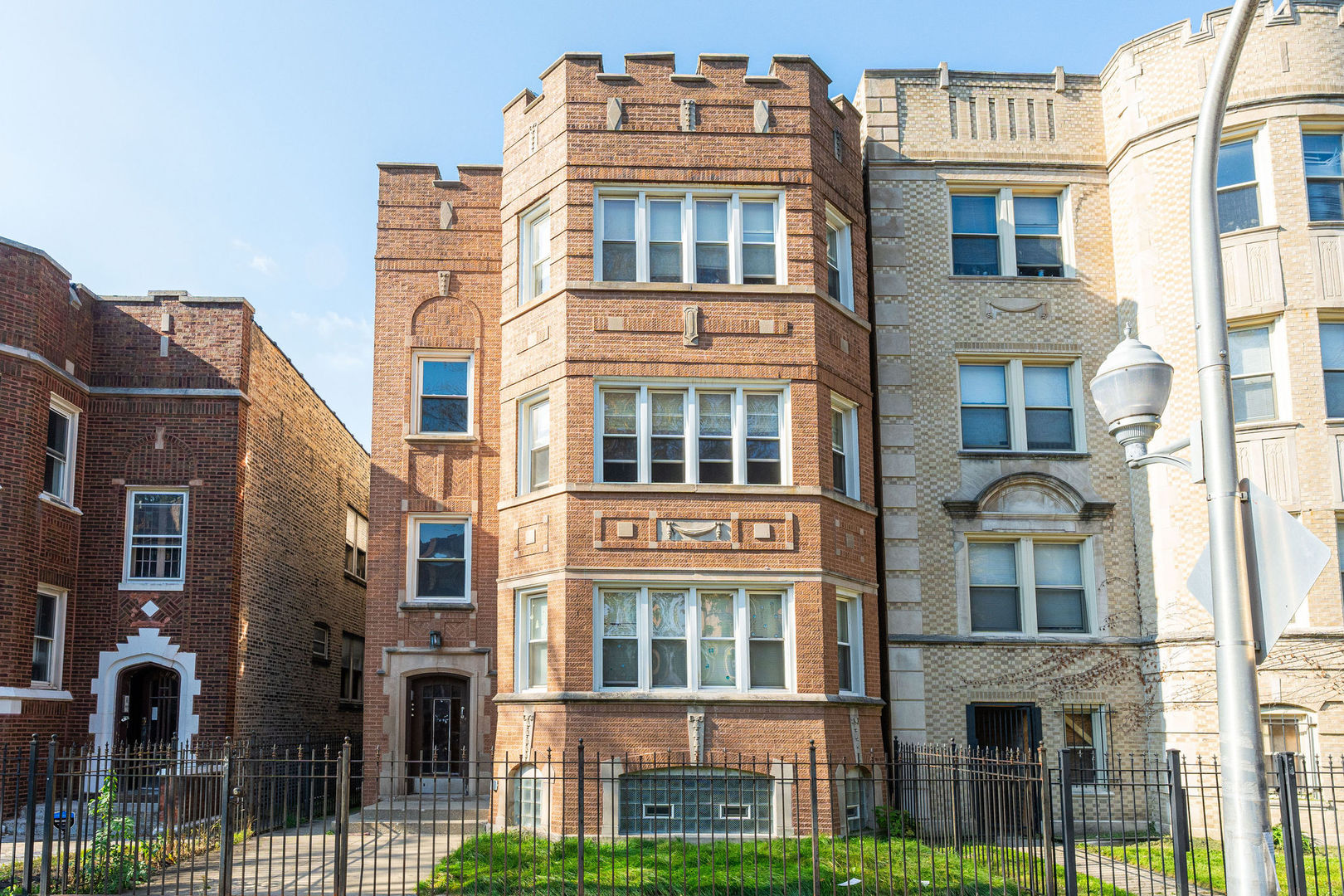 a front view of a multi story residential apartment building