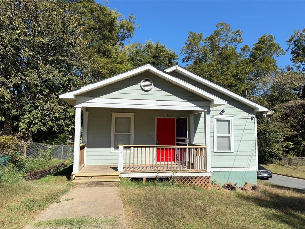 a front view of a house with a porch