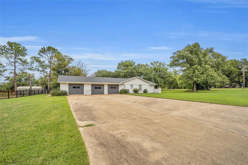 a front view of a house with yard