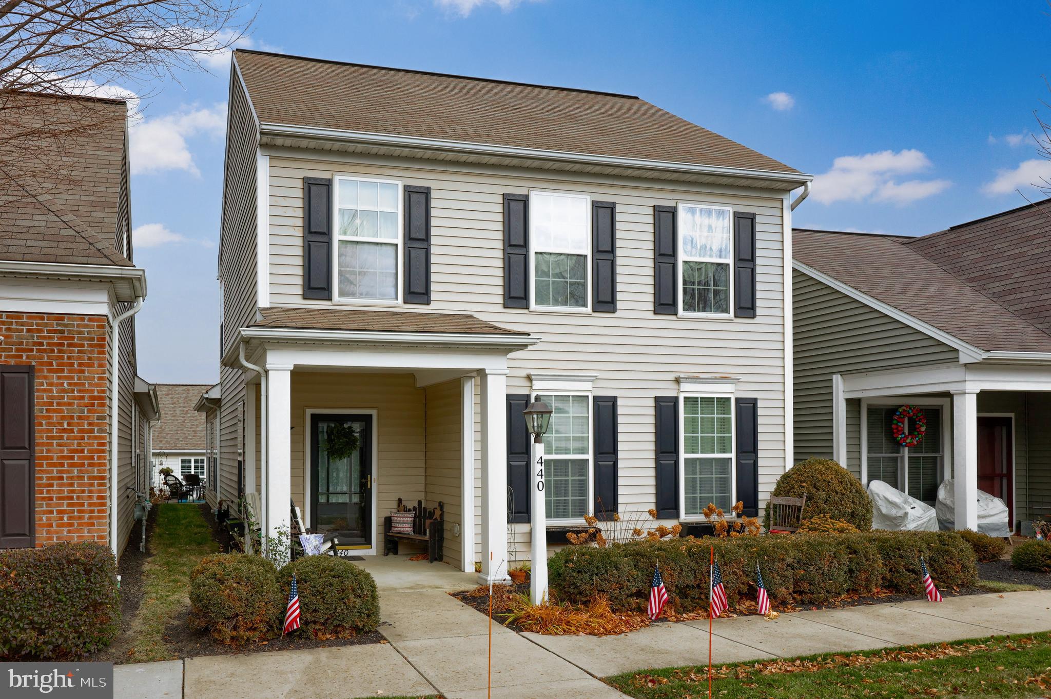 front view of a house with a yard