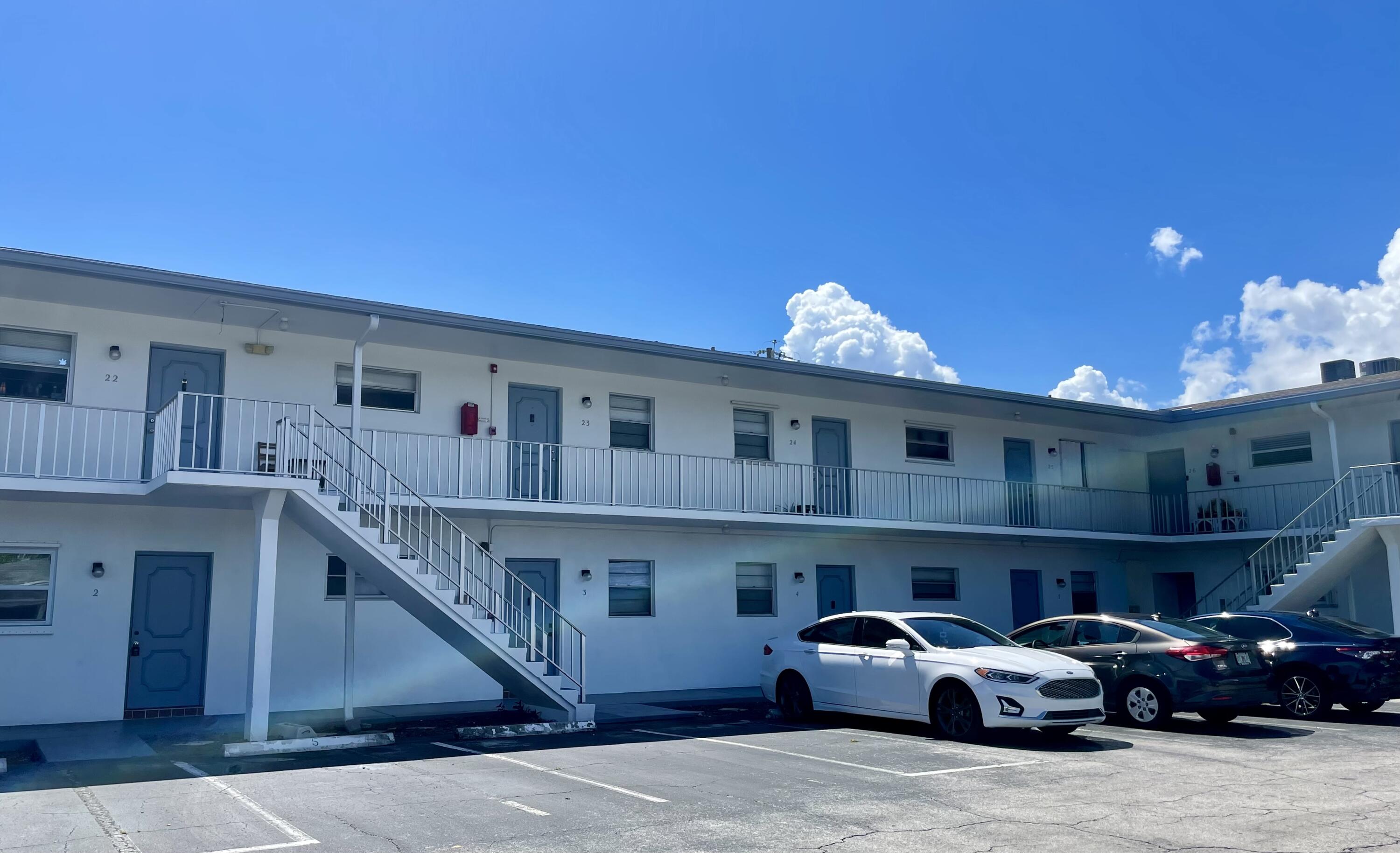 a cars parked in front of a building