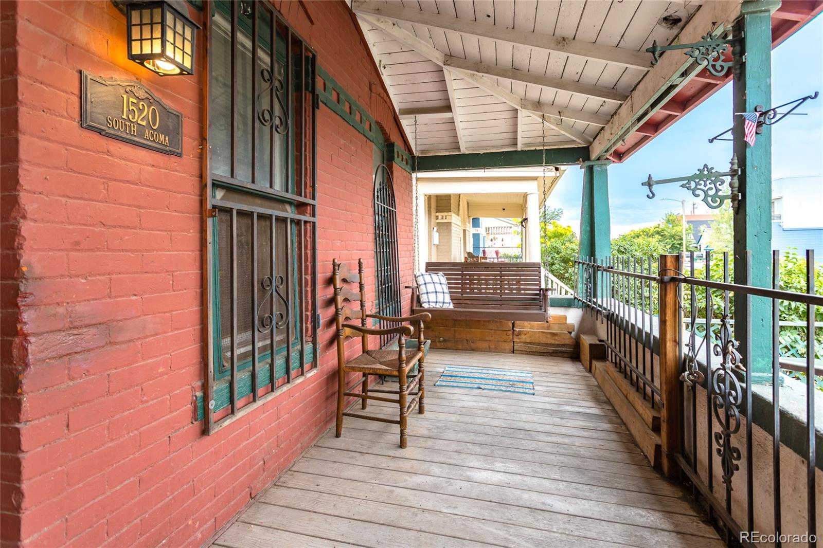 a view of a balcony with chairs