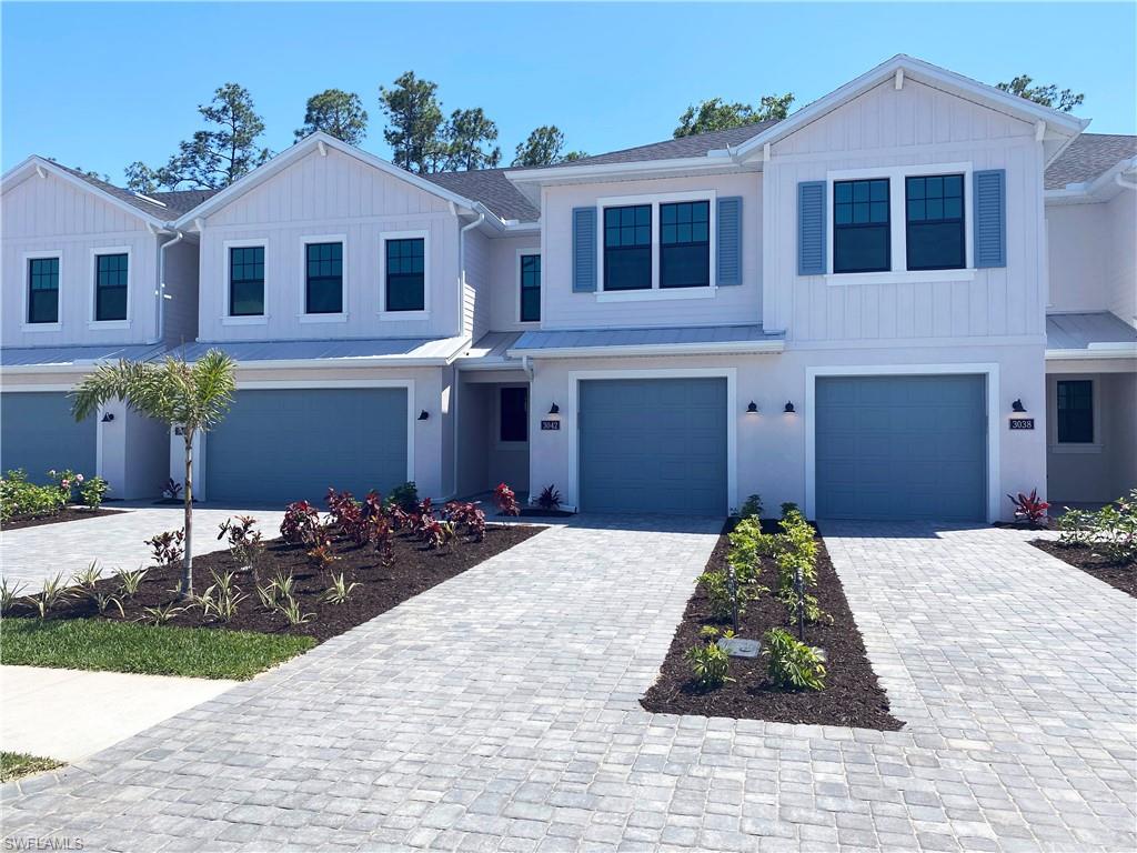 View of front of home featuring private garage entrance