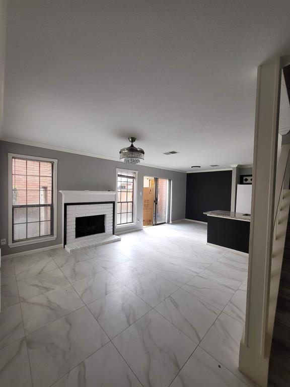 a view of a livingroom with a fireplace