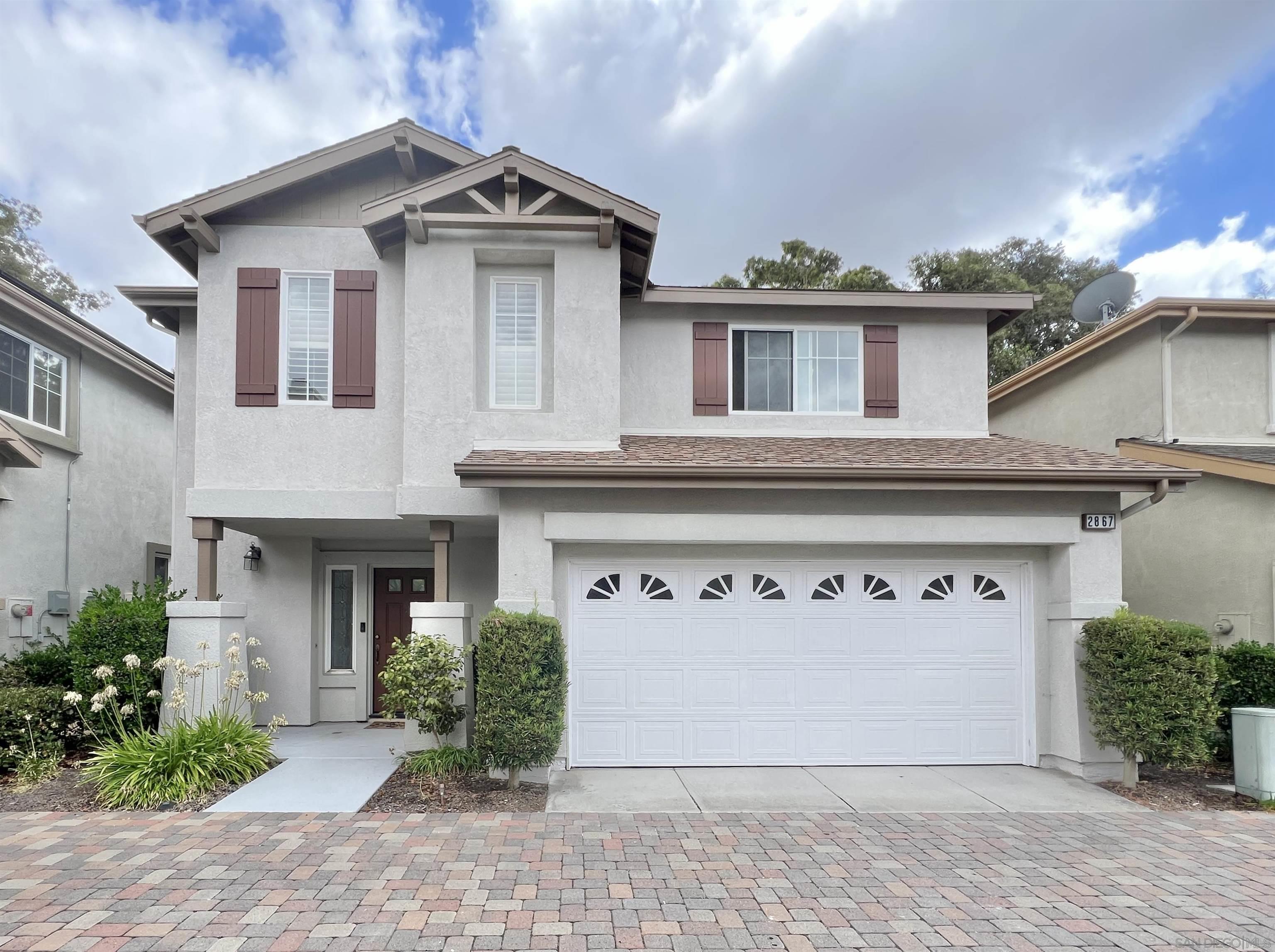 front view of a house with a garage