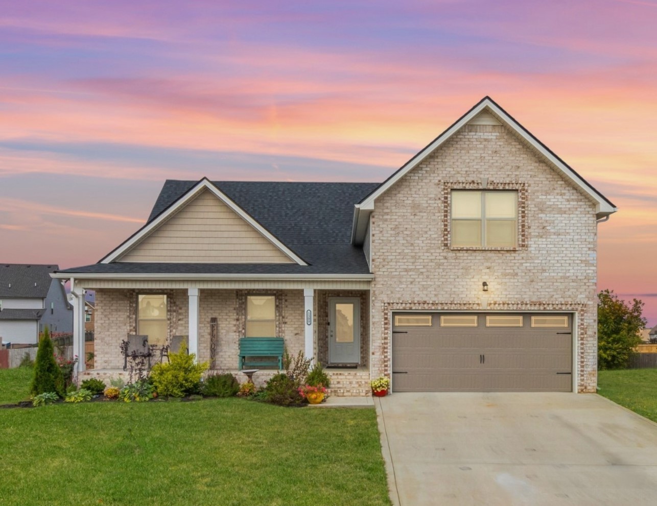 front view of a house with a yard