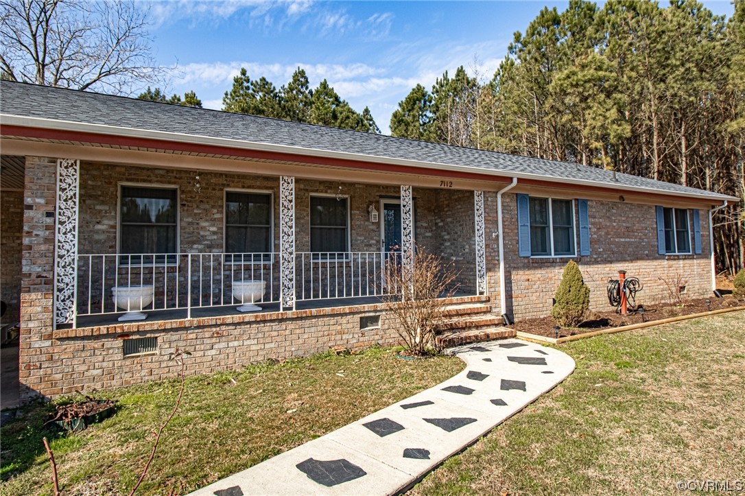 front view of a house with a patio