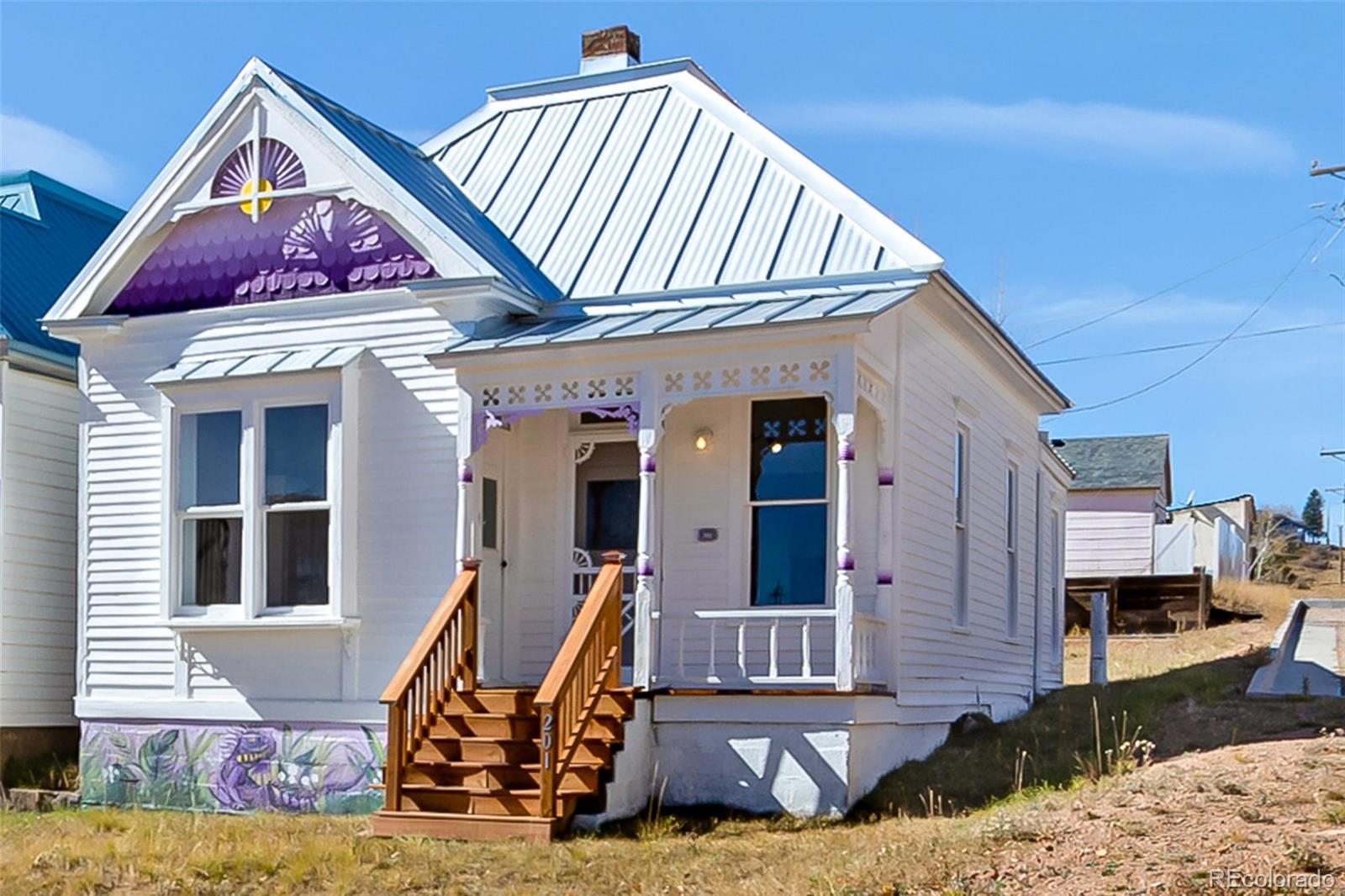 a front view of a house with a porch