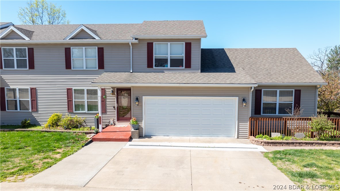 FLAT driveway w/ 2 car attached garage and HOA mai