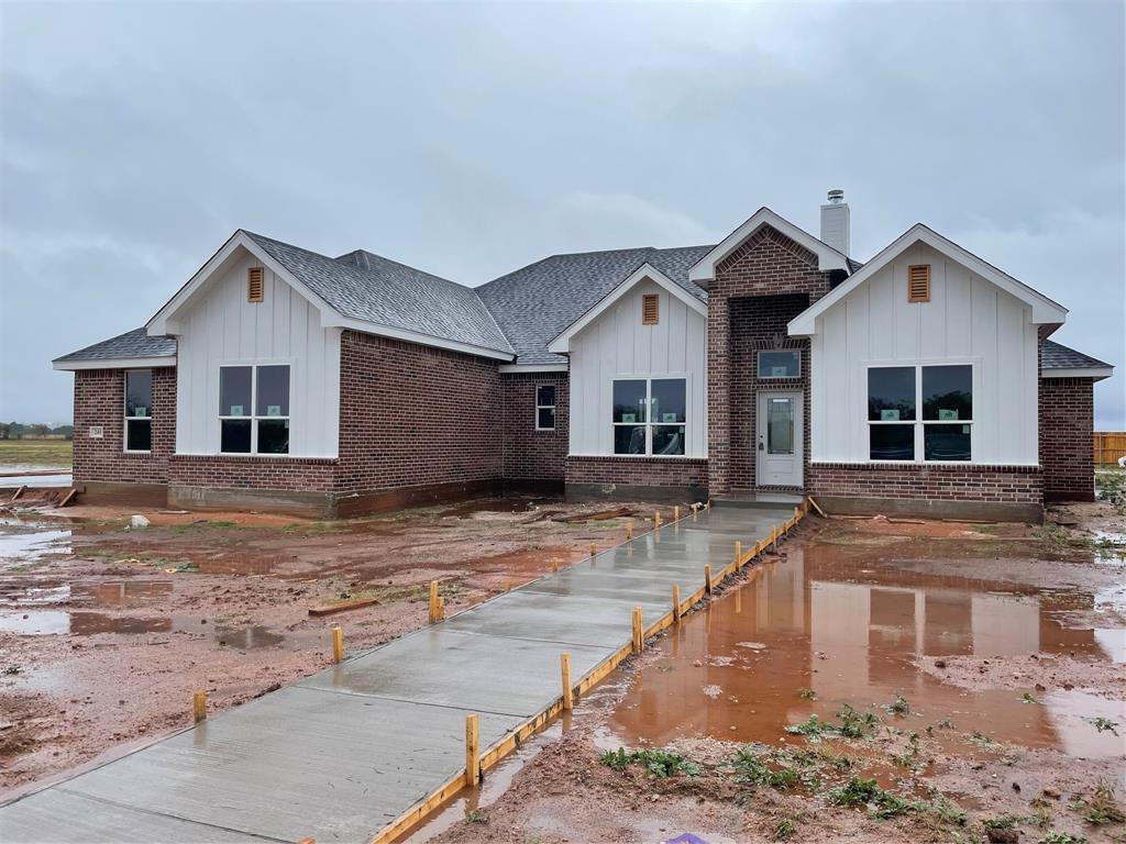 a view of a yard in front of a house